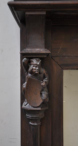 Старинный деревянный камин в неоготическом стиле, украшенный в декоративной манере «трубадур».-1